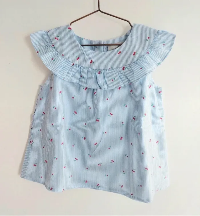 Blouse neuve sans manche Primark (36 mois)