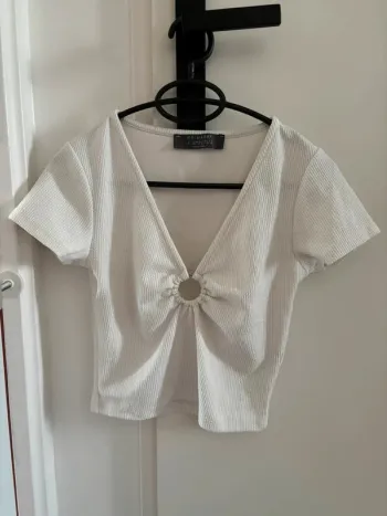 Top court écru Primark t.S 38-40 comme neuf