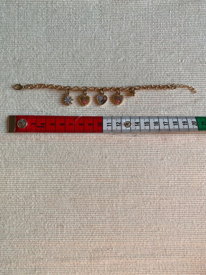 Bracelet en métal doré avec charms La Reine des Neiges Disney - photo numéro 8