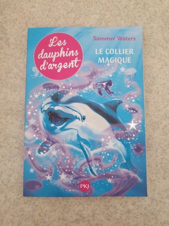 Les dauphins d'argent : Le collier magique