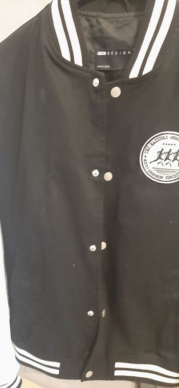 Veste noir et blanche neuve