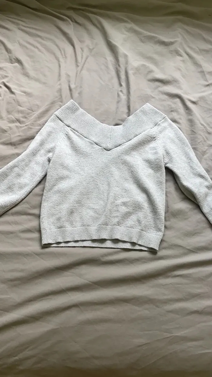 Pull épaule dénudé