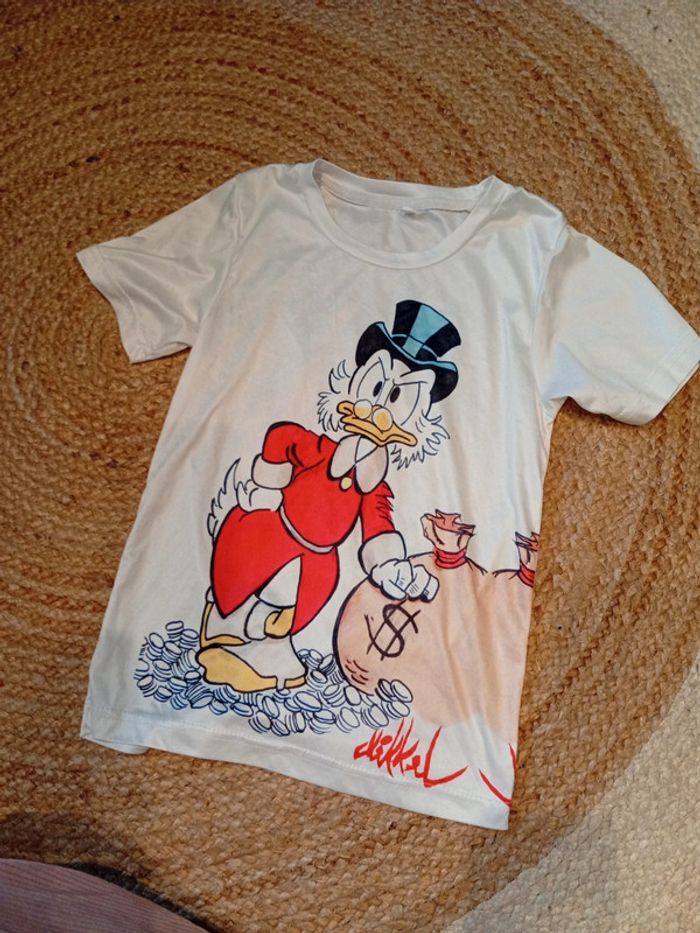 T shirt type acrylique 8 ans super état comme neuf Picsou