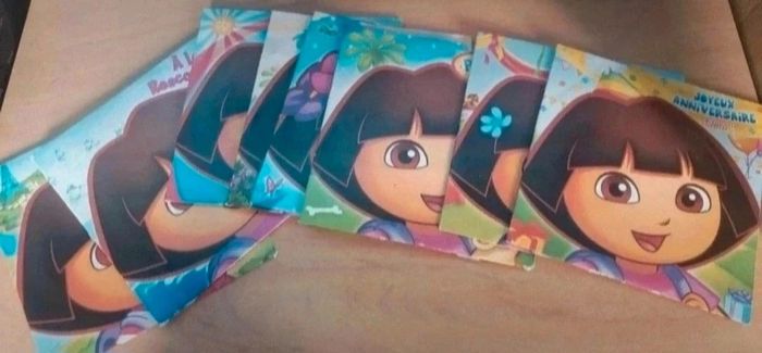 Boîte anniversaire dora lot 8 dvd + jeux de cartes - photo numéro 4