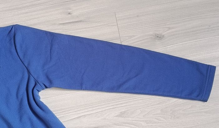 Sweat molletonné et zippé de couleur bleu clair. Taille 12 ans - photo numéro 7