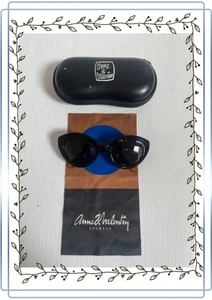 Lunettes de soleil Solento noir, très bon état