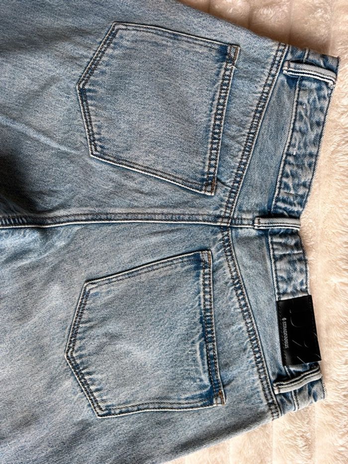 Jean troué bleu Stradivarius 38 - photo numéro 6