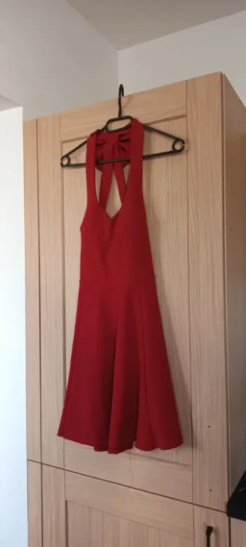 Robe patineuse nœud derrière