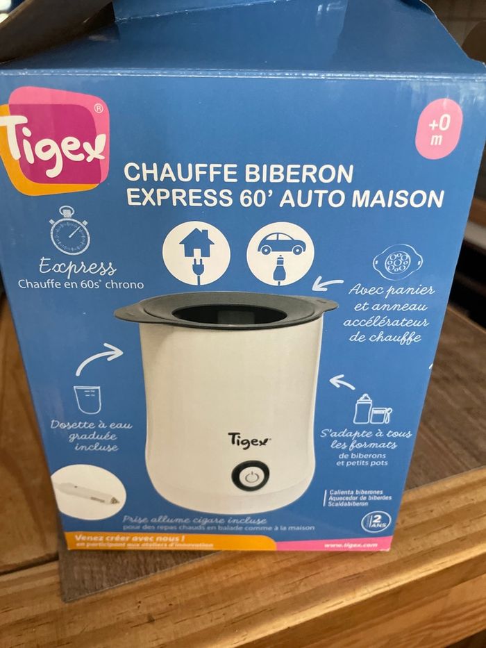 Tiger chauffe biberon