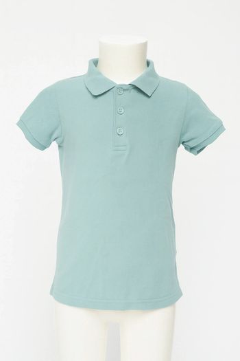 Polo garçon turquoise marque Basic taille 8 ans