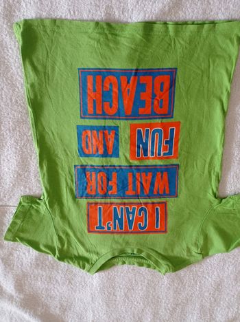 Polo pour l'été manches courtes vert amande avec inscription dessus voir photos âge 3 4 ans marque texte voir photos