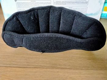 Support tête siège auto