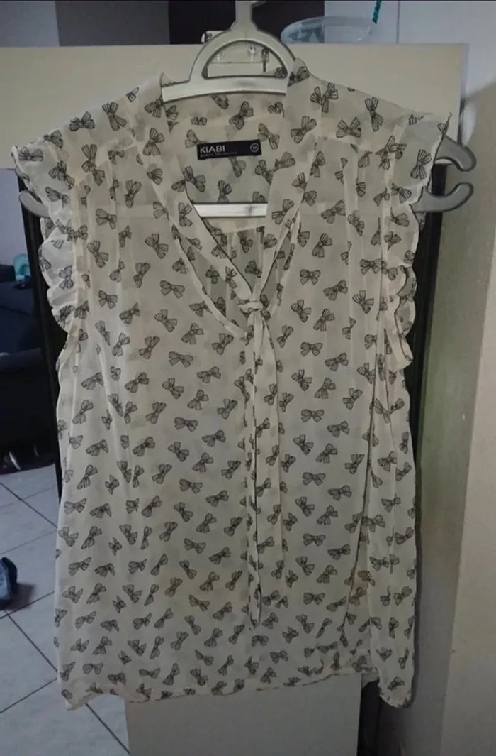 Blouse sans manche transparente motif nœud 38 kiabi