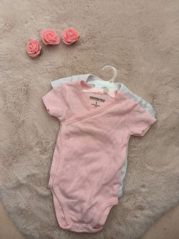 Lot deux bodies blanc rose orchestra 3 mois