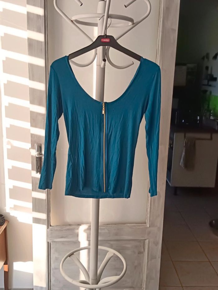 Blouse fermeture doré dans le dos taille 36