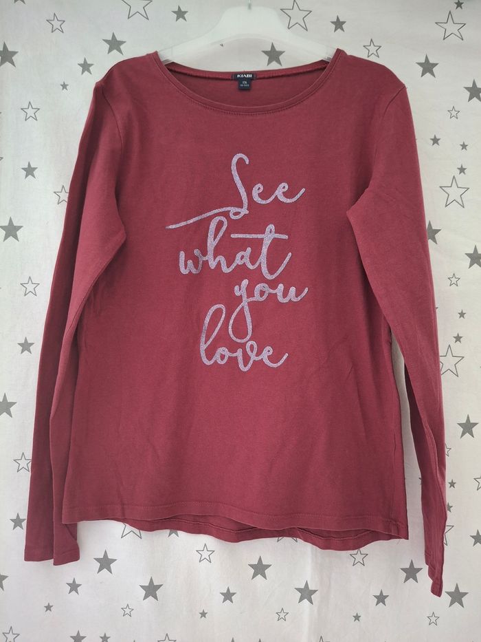 Tee-shirt manches longues bordeaux 12 ans Kiabi
Très bon état ni trous ni tache - photo numéro 2