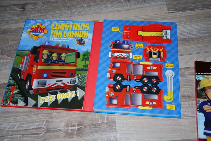 lot 2 livres Sam le pompiers construis ton camion" et sam sauve noel - photo numéro 2