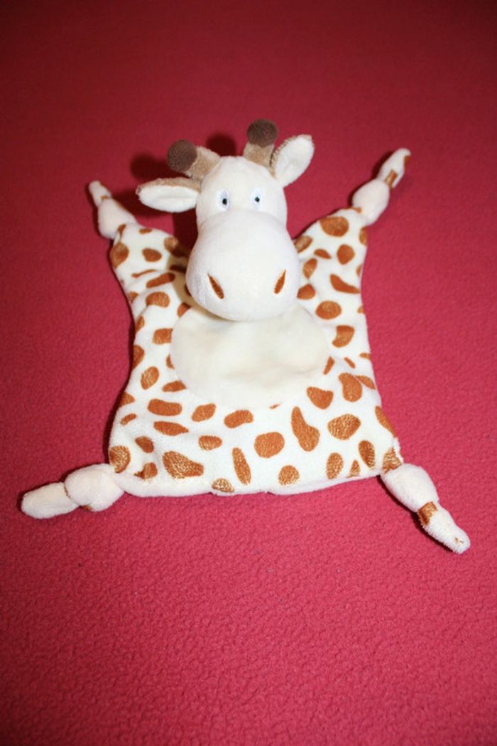 Doudou girafe en parfait état