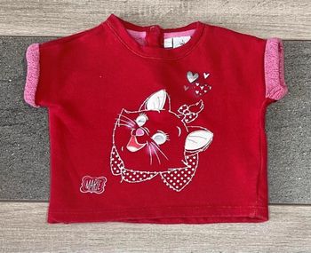 Pull sans manche rouge Marie disney 23 mois excellent état