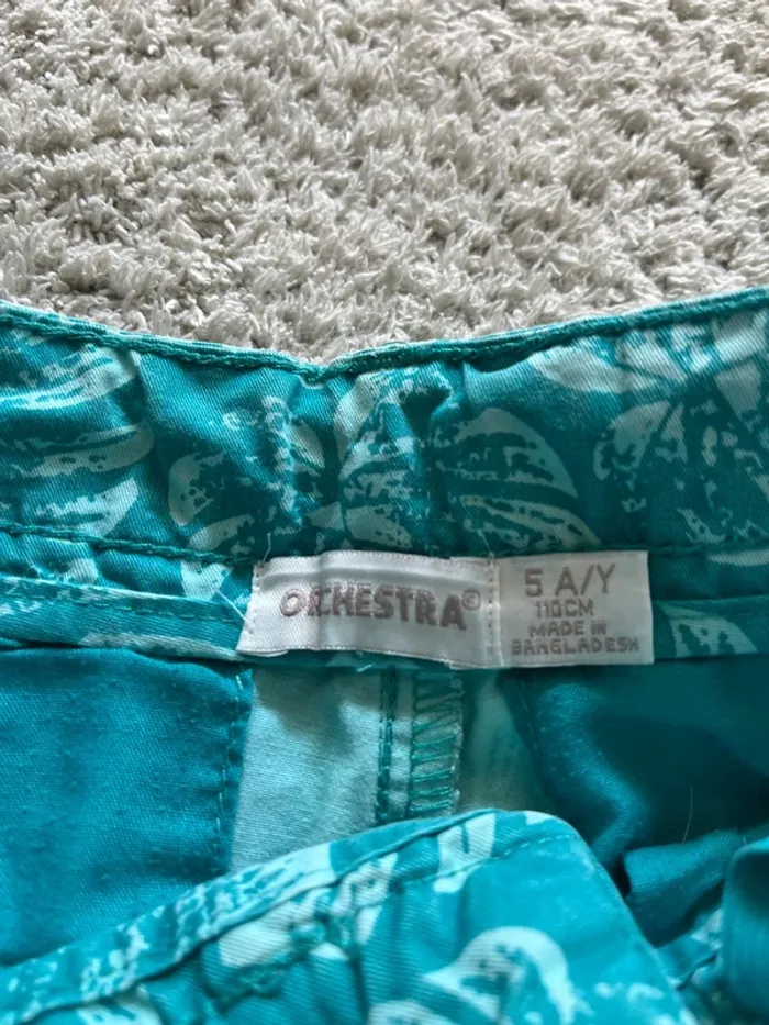 Short à fleurs bleu turquoise marque Orchestra taille 5 ans - photo numéro 4