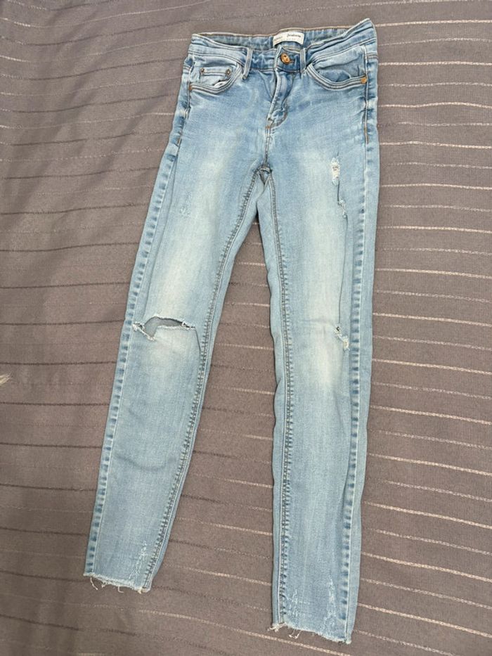 Beau jean skinny légèrement destroy bleu clair stradivarius 36