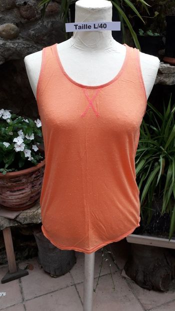 Débardeur orange coutures roses
