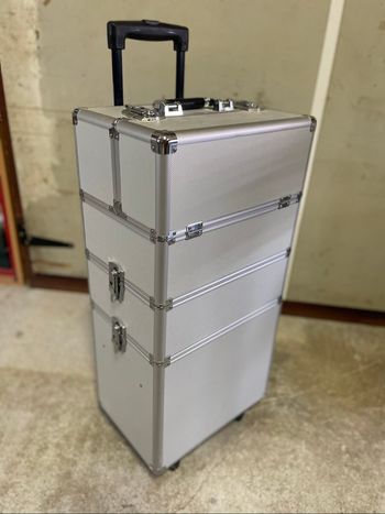 Valise aluminium à roulettes