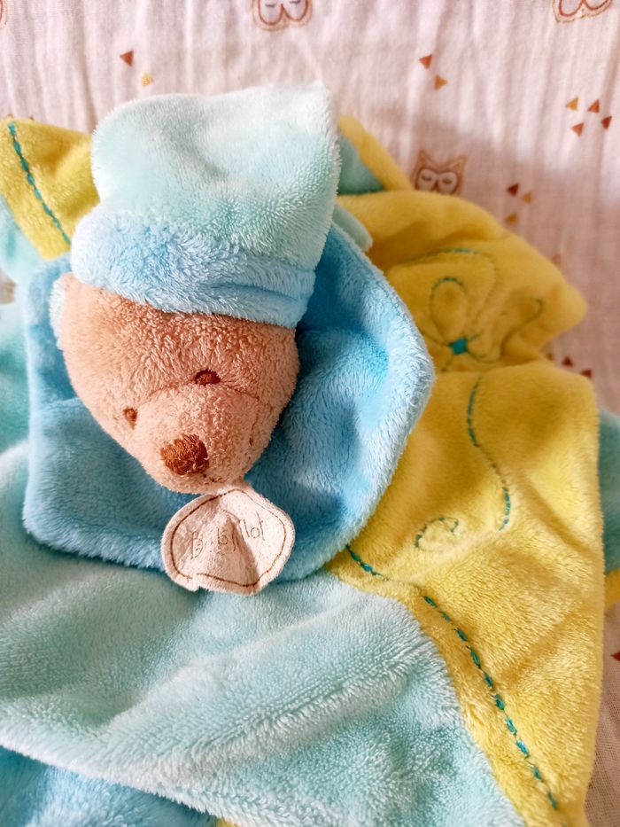 Doudou ours Baby Nat bleu jaune bonnet - photo numéro 2