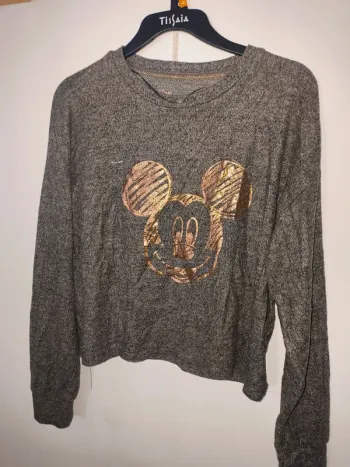 Pull court Disney excellent état taille M