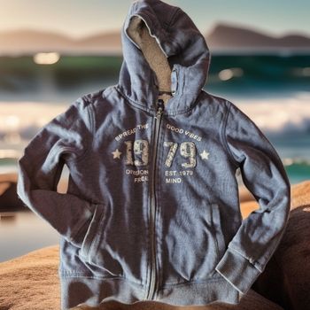 Superbe veste zippée, fourrée, a capuche
