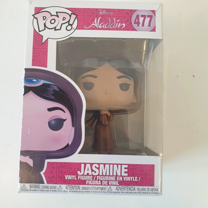 Funko Pop Jasmine chase #477 face avant de la boite décoloré par le soleil