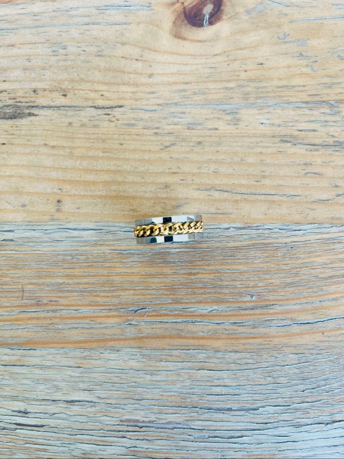 Bague bicolore rotative