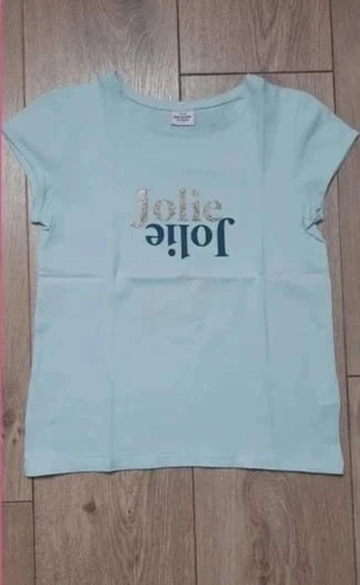 Tee-shirt MC tape à l'oeil menthe "jolie" 8 ans en parfait état