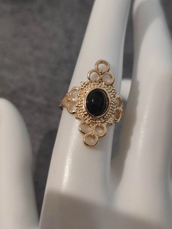 Bague fantaisie métal doré et pierre noire