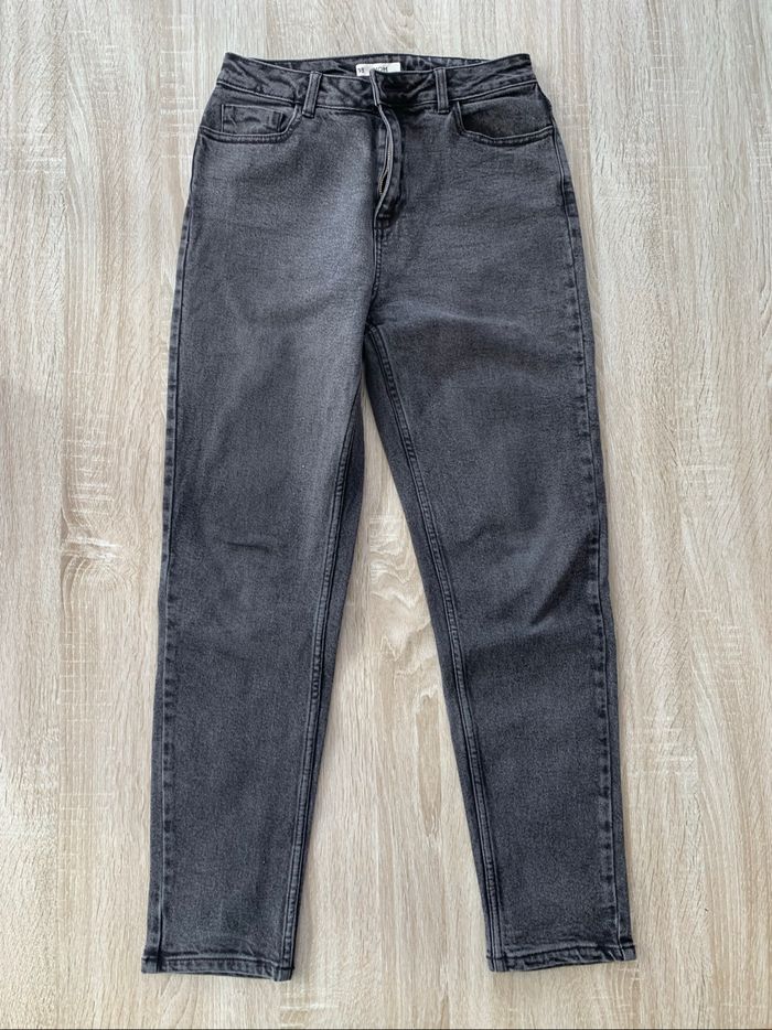 Jean mom noir délavé