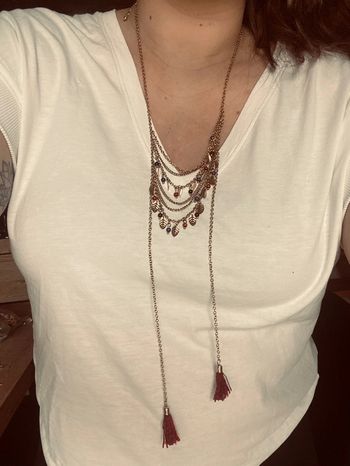 Long collier doré avec chaînes et pompons Promod très bon état