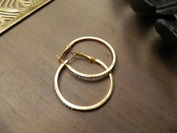 Anneaux /créoles doré a strass neuf