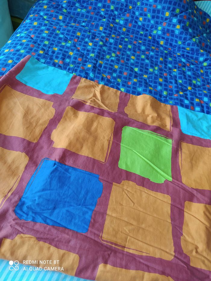 Sac de couchage double face fermeture par boutons pression