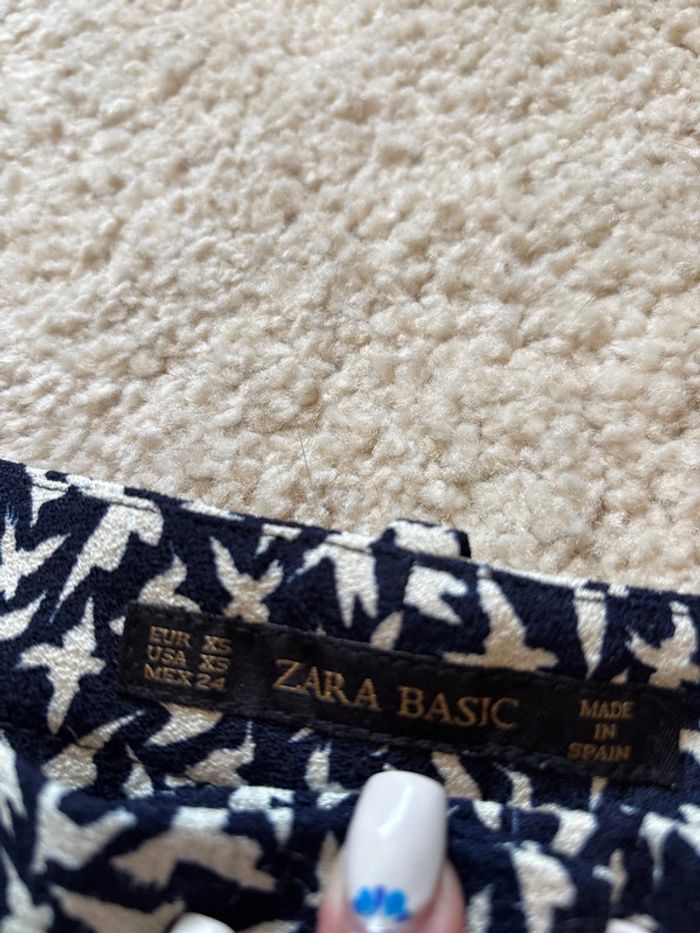 Short bleu marine et blanc motif oiseau Zara taille XS - photo numéro 2