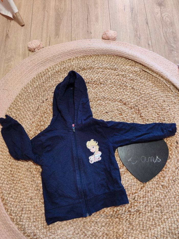 Gilet zippé à capuche