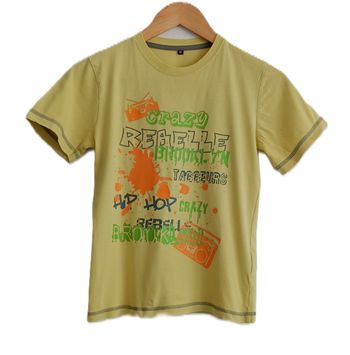 T shirt jaune radio taches de peinture. La Halle. Coton. Taille 10 ans
