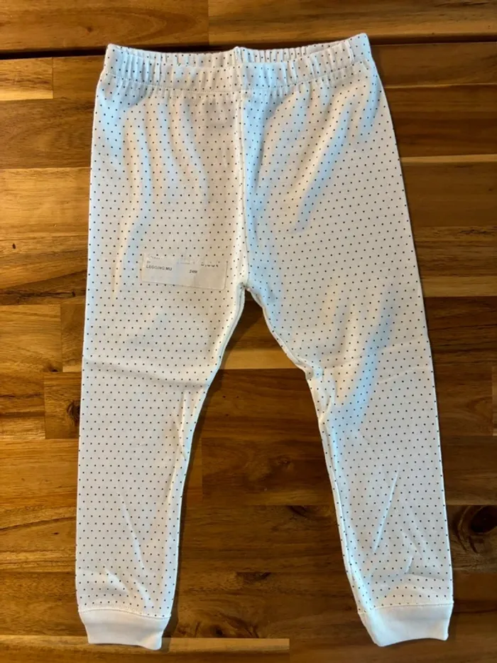Legging blanc à pois noir