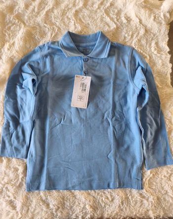Polo bleu clair M&S taille 4/5 ans
