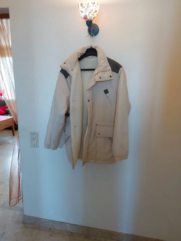 Manteau avec effet fourrure