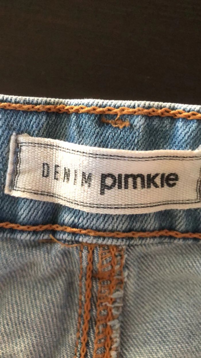 Jeans troué - photo numéro 2