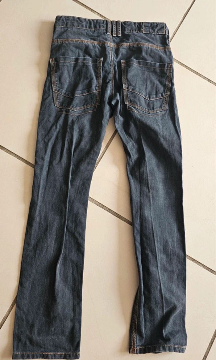 Jean okaidi 10 ans - photo numéro 3