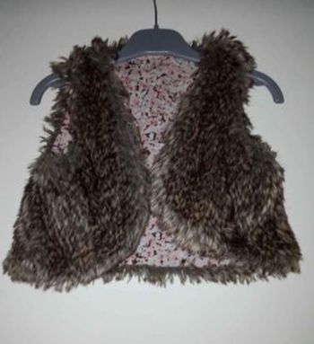 Boléro tape à l'oeil taille 4 ans