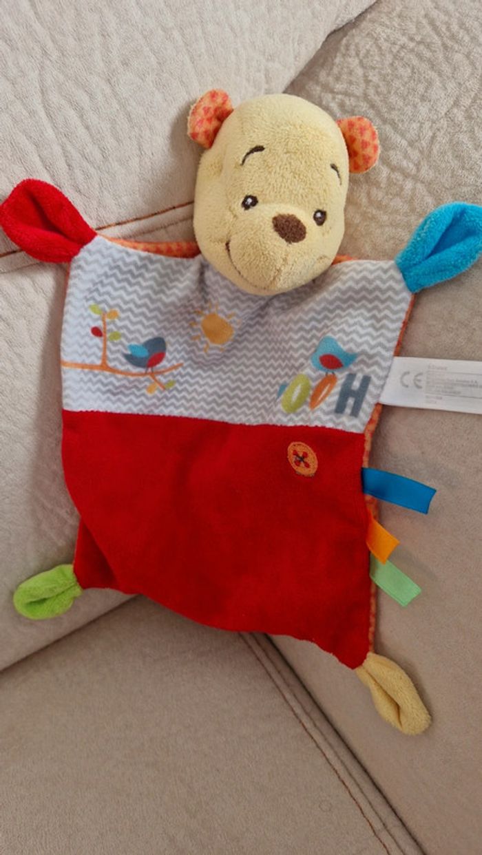 Doudou plat winnie l ourson Nicotoy