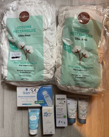 Lot de 8 produits neufs bébé : 4 crèmes de change + eau de senteur + sérum physiologique + 2 sachets coton pad