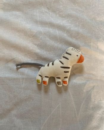 Petit doudou zèbre Sucre d’Orge